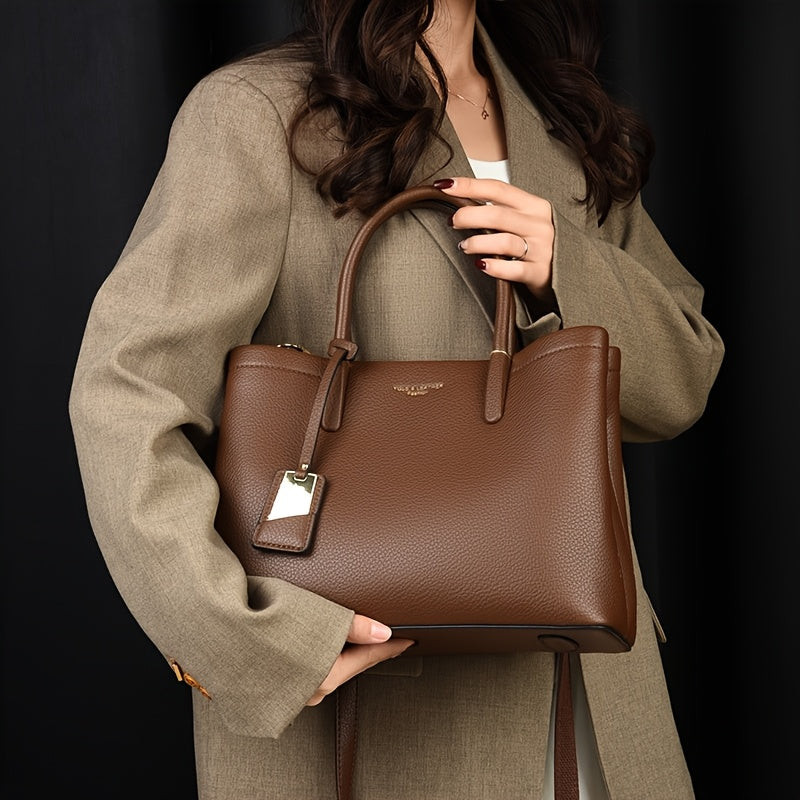 Elegant black handbag with adjustable strap and zipper closure