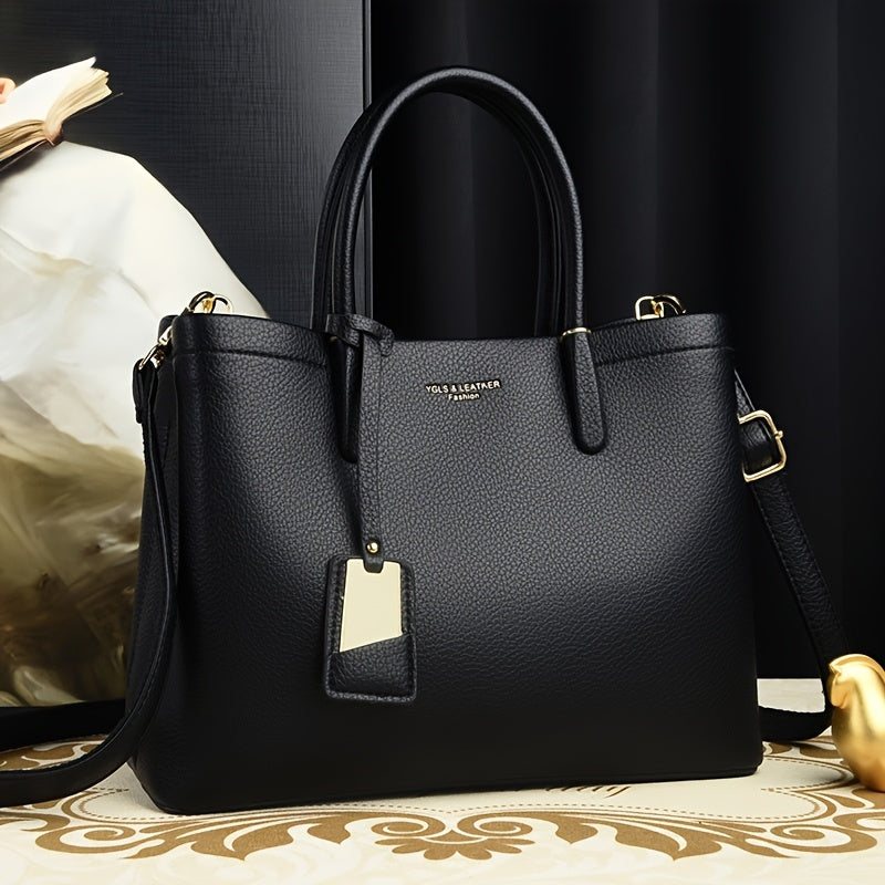 Elegant black handbag with adjustable strap and zipper closure