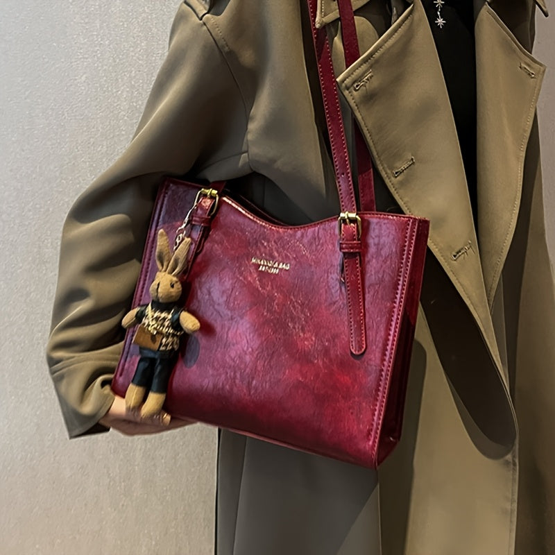 Elegant red tote bag with bunny charm for special occasions