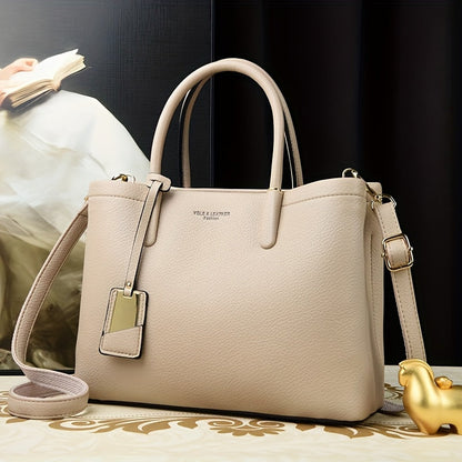 Elegant black handbag with adjustable strap and zipper closure