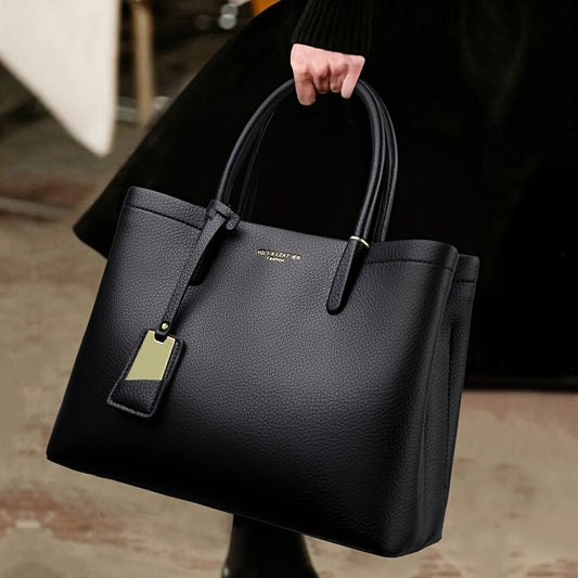 Elegant black handbag with adjustable strap and zipper closure